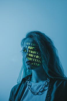 Stylized portrait of a woman with binary code projected on her face, evoking themes of technology and identity.