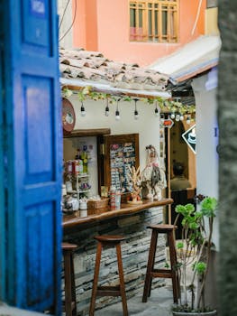 Explore a quaint outdoor bar in Cusco, Peru, featuring rustic decor and inviting stools.